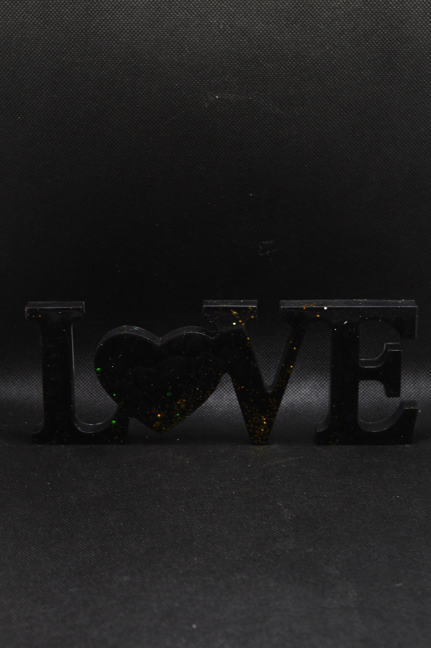 Love noir à paillettes dorées