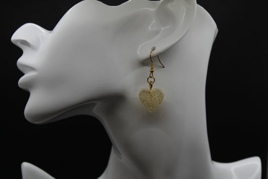 Boucle d'oreilles coeur blanc à paillettes